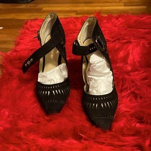 Black stilleto suede shoe